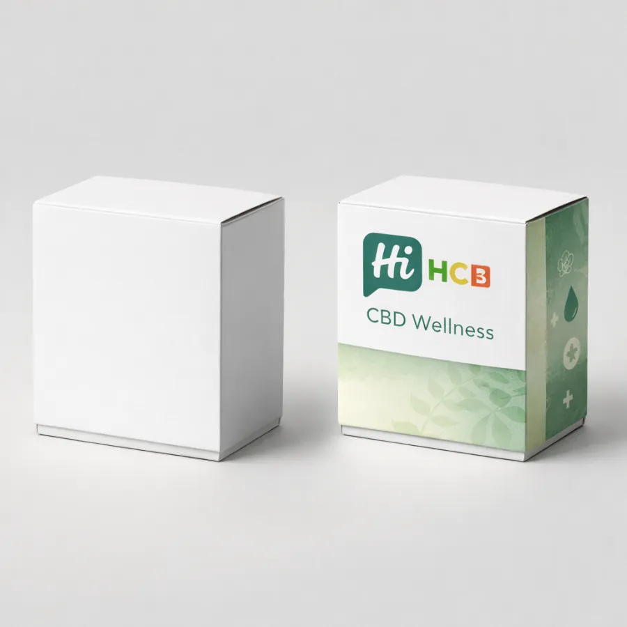 A pair of white square boxes with decorative sleeves showing green leaf motifs and wellness symbols- class=